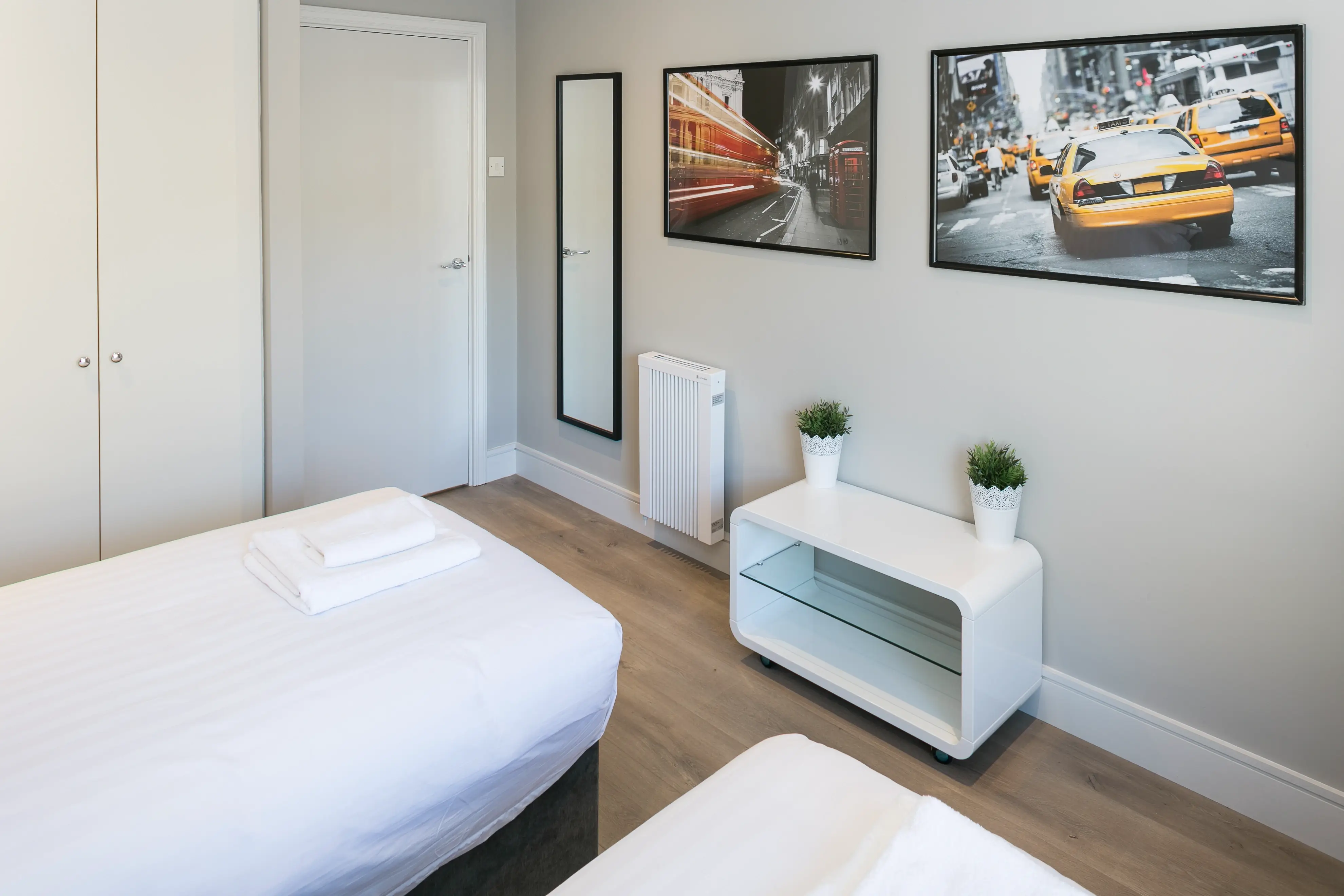 Twin bedroom with sleek furnishings