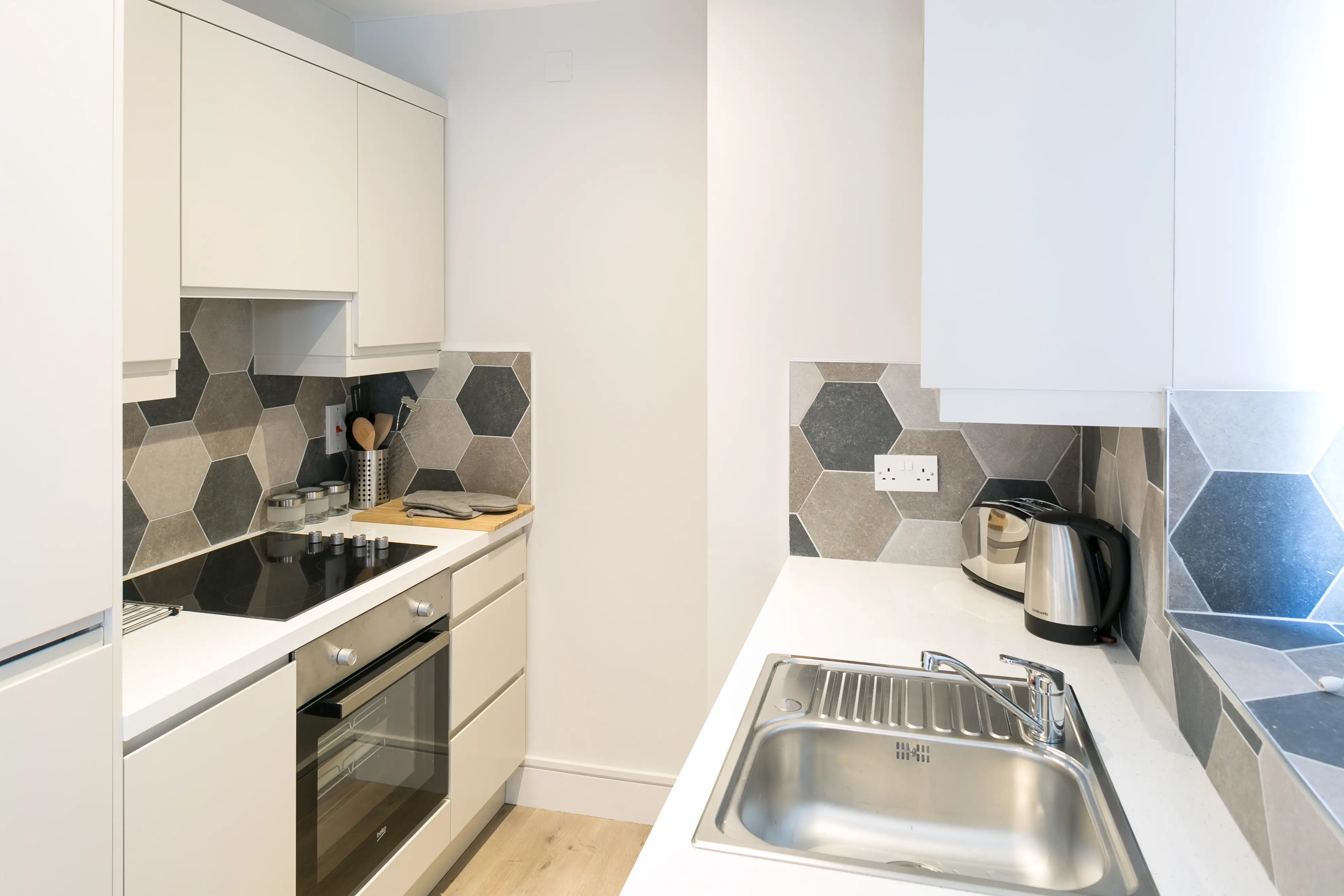 Contemporary galley kitchen with modern furnishings