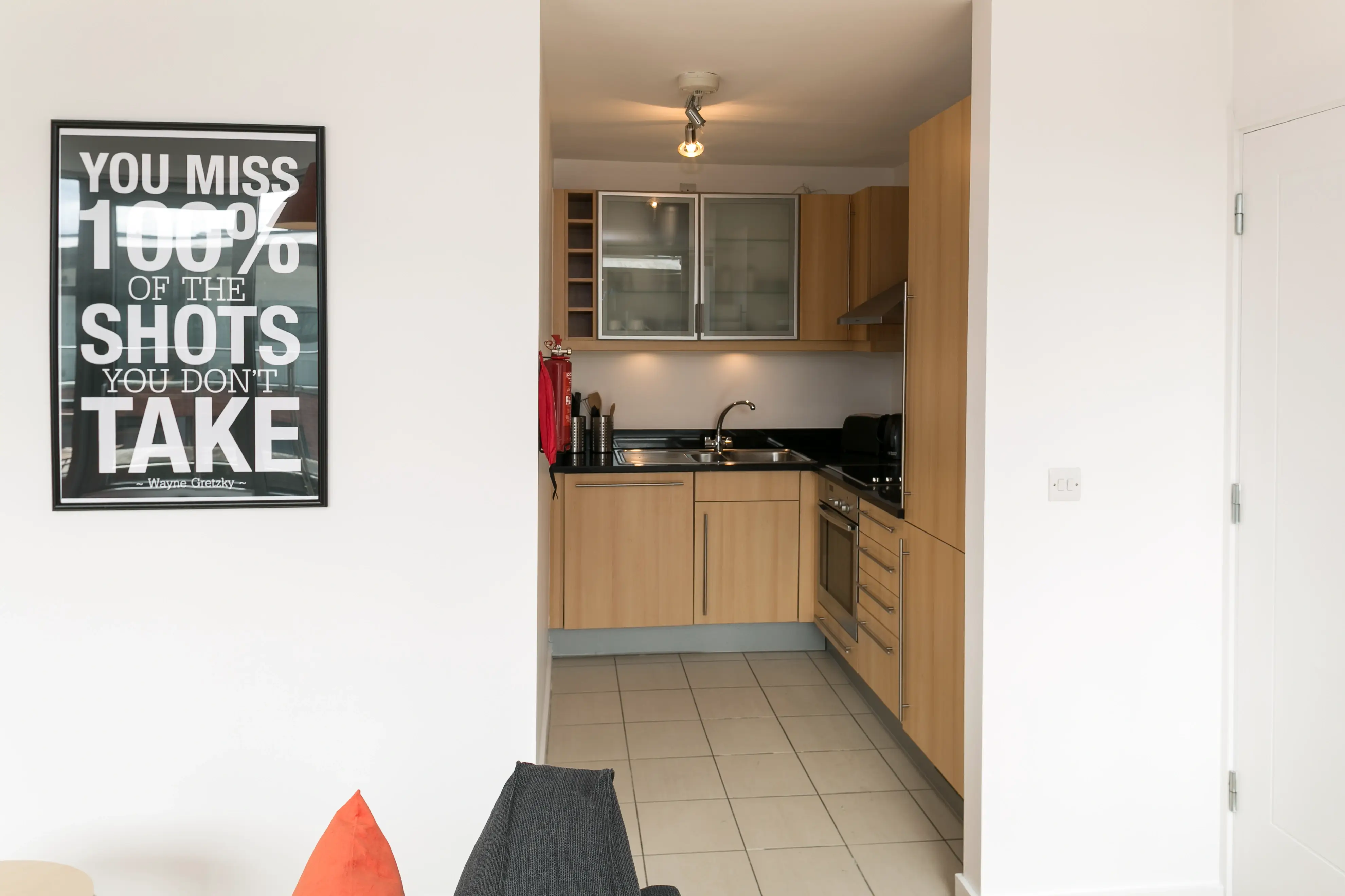 Modern galley kitchen with integrated appliances