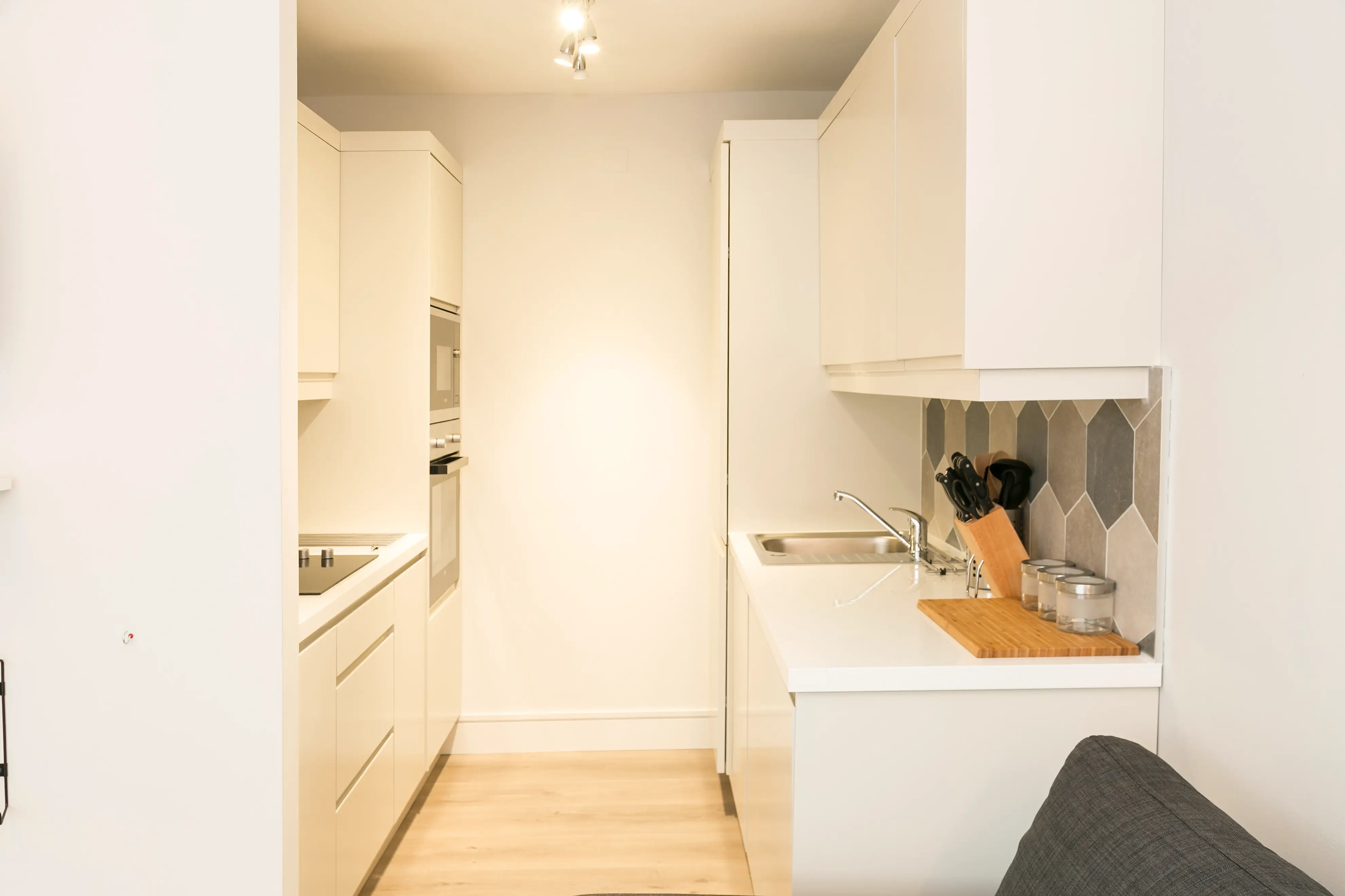 Modern galley kitchen with integrated appliances