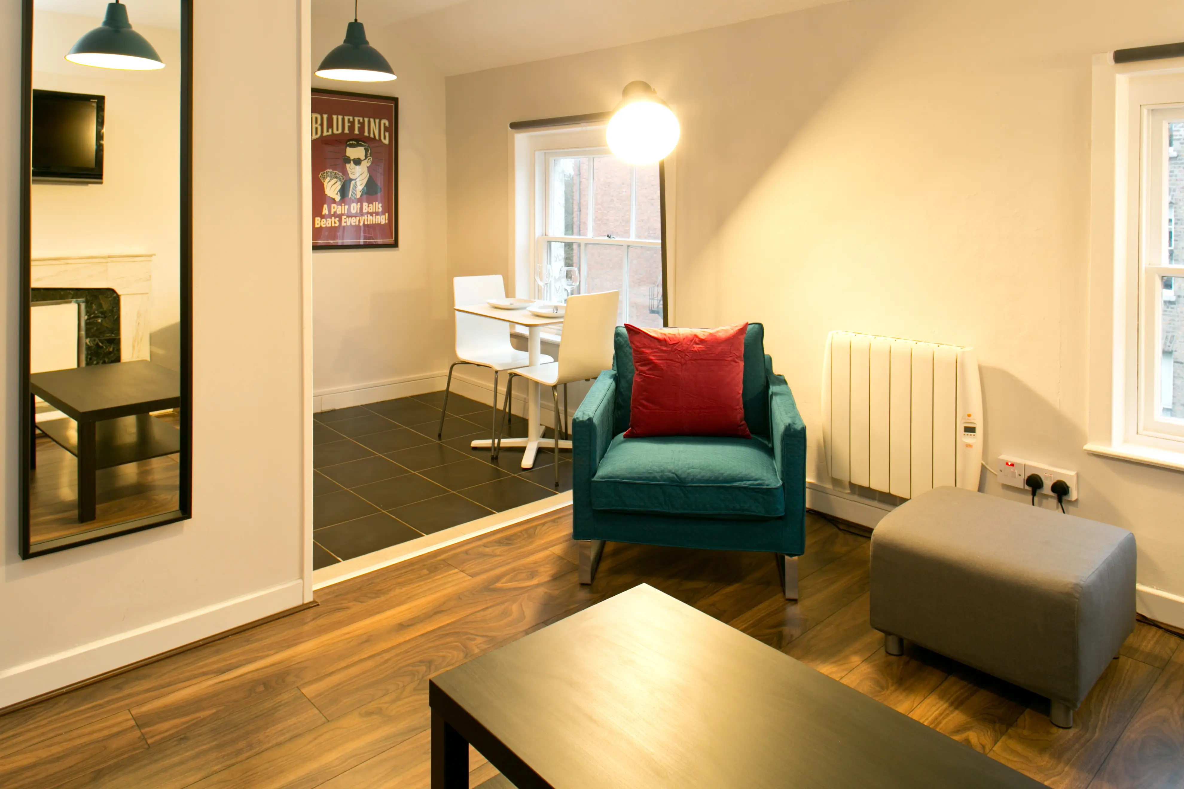 Living room & kitchen in 1x bed city centre apartment